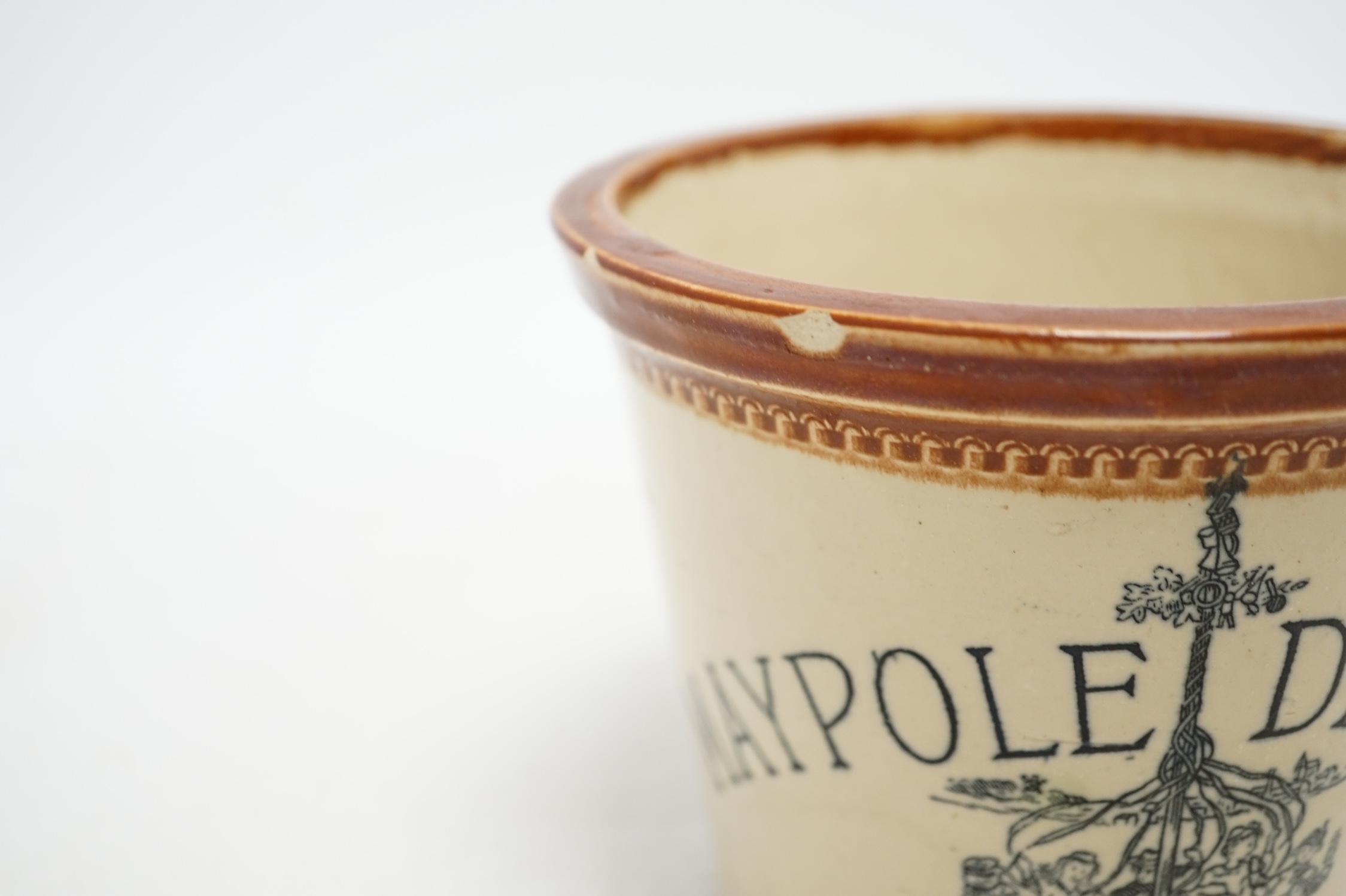 A late 19th century Maypole Dairy Co Ltd butter crock with handle, 12cm tall. Condition - fair